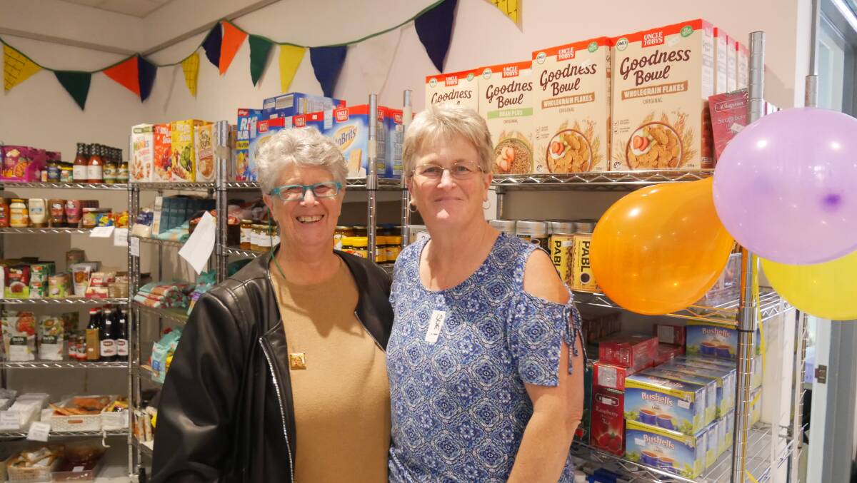 Sapphire Community Pantry volunteers Christine McDowell and Sue Rootsey. Picture by Ellouise Bailey 