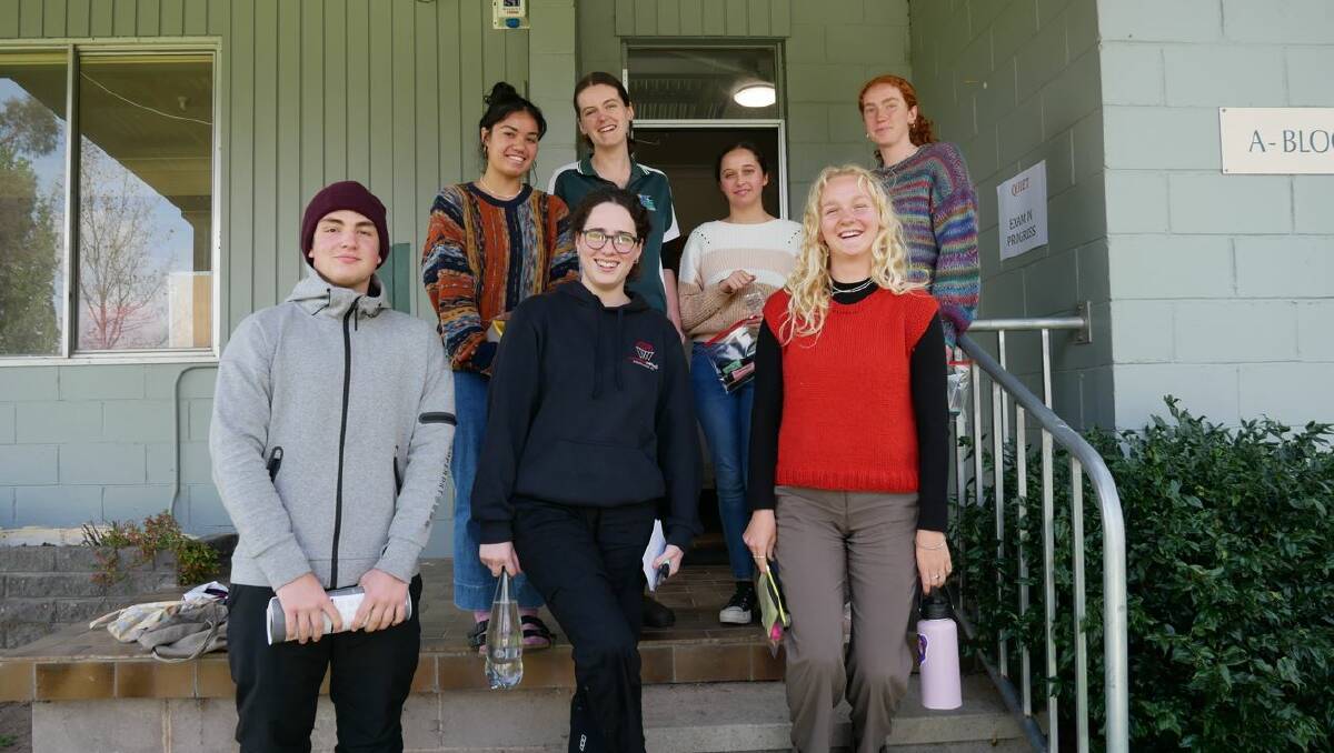 Sapphire Coast Anglican College students just minutes after their first HSC exam. Bottom left to right: Max Stylianou, Kiera Hruskova, Poppy Collins. Top left to right: Alisi Arbon, Kakayla Alexander, Chantelle Bennett, and Zali Smith. Picture by Ellouise Bailey 