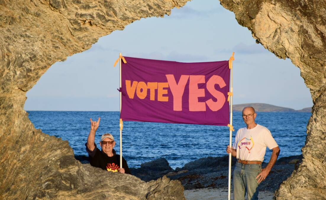 Yes23 campaigners Steve Payne and Peter Phillips with their banner at Australia Rock. The Narooma and surrounding communities group of Yes23 volunteers are holding a community forum in Narooma on September 24 and a concert in Central Tilba on October 1. Picture supplied