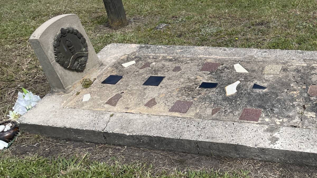 One of the unnamed graves that are identifiable as belonging to a serviceman because of the Rising Sun emblem on the headstone. Picture by Marion Williams