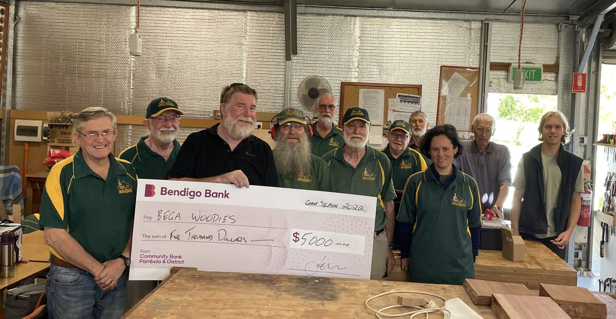 Wednesday's Woodies at their Tarraganda workshop. Left to right - Paul Healey, Ray Toms, Graham Stubbs (Bendigo bank), Don Firth, Richard Kleine, Doug Batty, Sarah Davis and Jamie Parker Barnes. Background - Paul Croese and Bruce Dunlevie. Picture by Sam Armes.