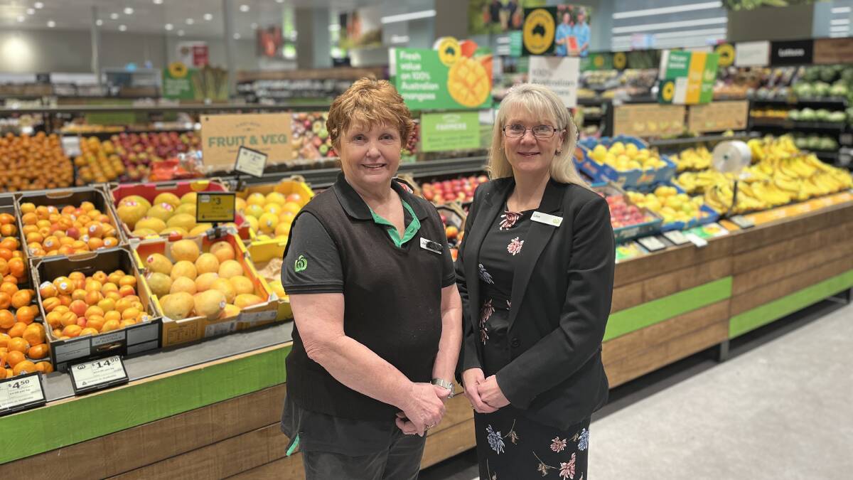 Jan Wheeler with Woolworths Tura Beach store manager Lisa Payne. Picture by James Parker