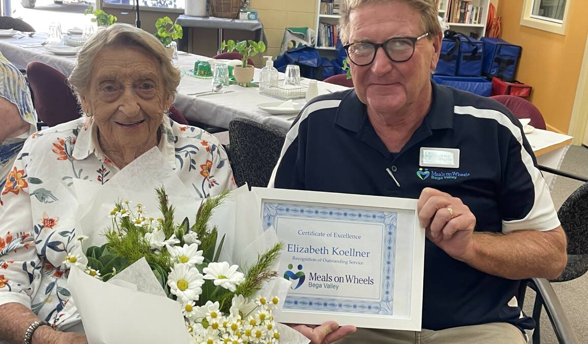 Betty receiving an award for her service with Tathra Meals on Wheels (long-term president, director, devout volunteer and "dish washer" for 40 years). Picture by James Parker