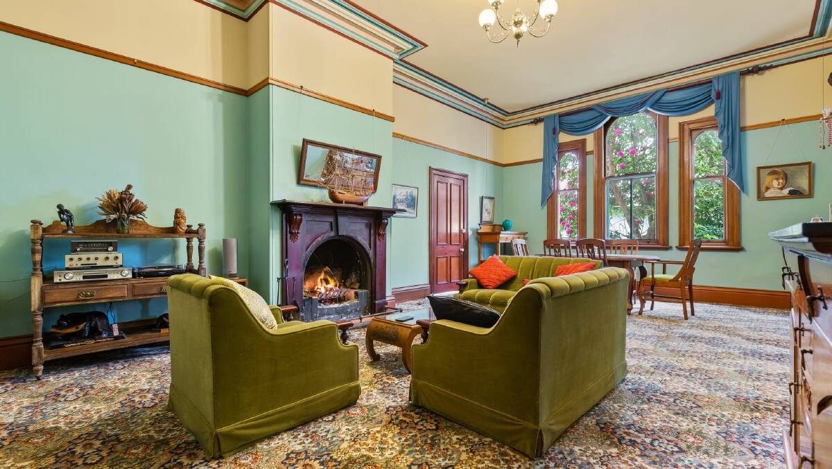 The open fireplace invites all to take a seat and soak up the history. Picture by Double Take Photography