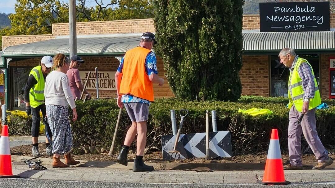 Locals from Pambula Beach Helen and Chris, Tracey and Rotarians David Wriedt and John Croll work on the Pambula roundabout. Picture supplied.