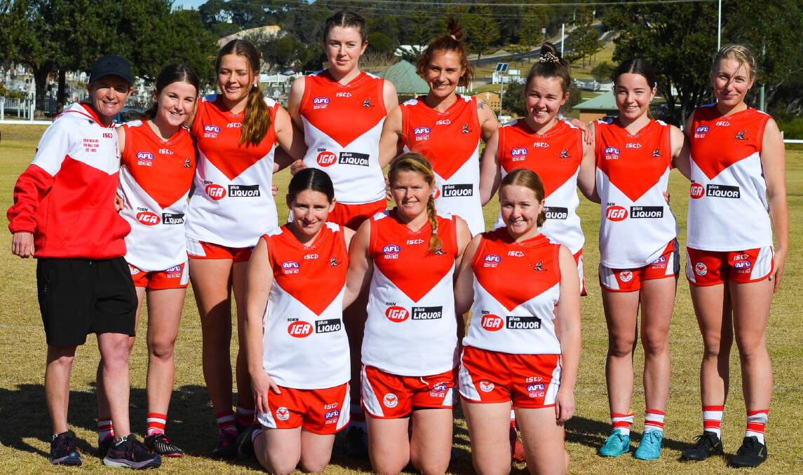 100-gamer Kate Mitchell (front centre) and her Whalers team-mates on Saturday. Picture supplied
