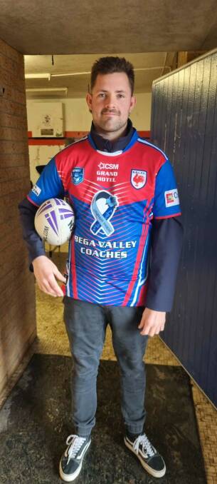 Bega Roosters first grade coach Cameron Vazzoler in a limited edition jersey, the first grade players wore at the weekend before auctioning them off to raise money for the GBS Foundation. Picture supplied 