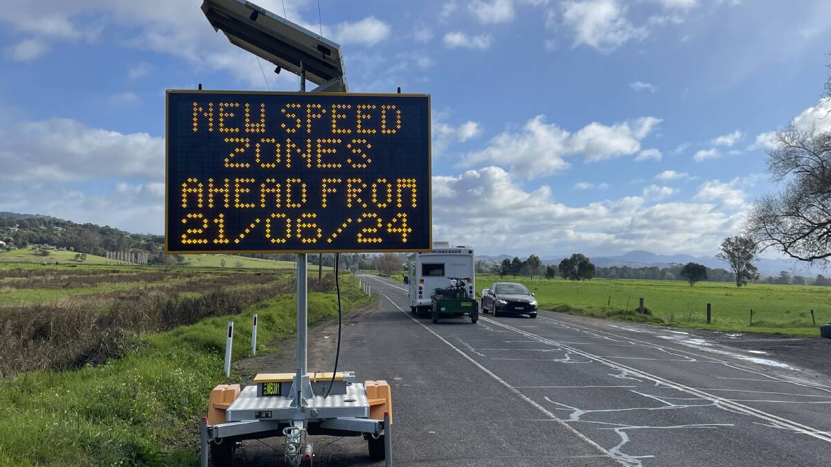 Signs indicating the change to speed limits along Tathra Road have been installed. Picture by Ben Smyth