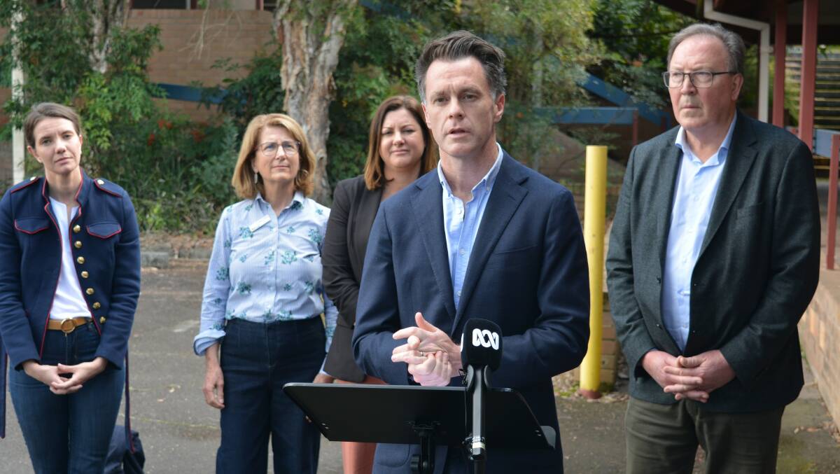NSW Premier Chris Minns addresses the media at the former Bega TAFE site on Tuesday, August 29, along with Minister for Housing and Homelessness Rose Jackson, Bega Valley Shire councillor Helen O'Neill, federal member for Eden-Monaro Kristy McBain and state member for Bega Michael Holland. Picture by Ben Smyth