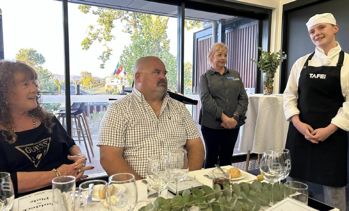 Lilli Britton shares her experiences in the Tasting Success program as proud parents Mel and Dave and head teacher Deirdre Jory watch on. Picture supplied