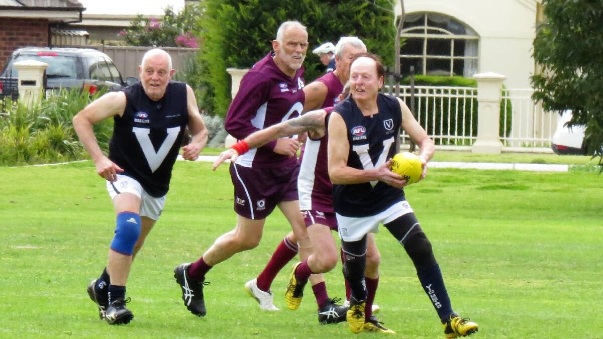 Neil Rainbow in action during the 2022 AFL Masters championship in Adelaide. Picture by Shirley Rixon