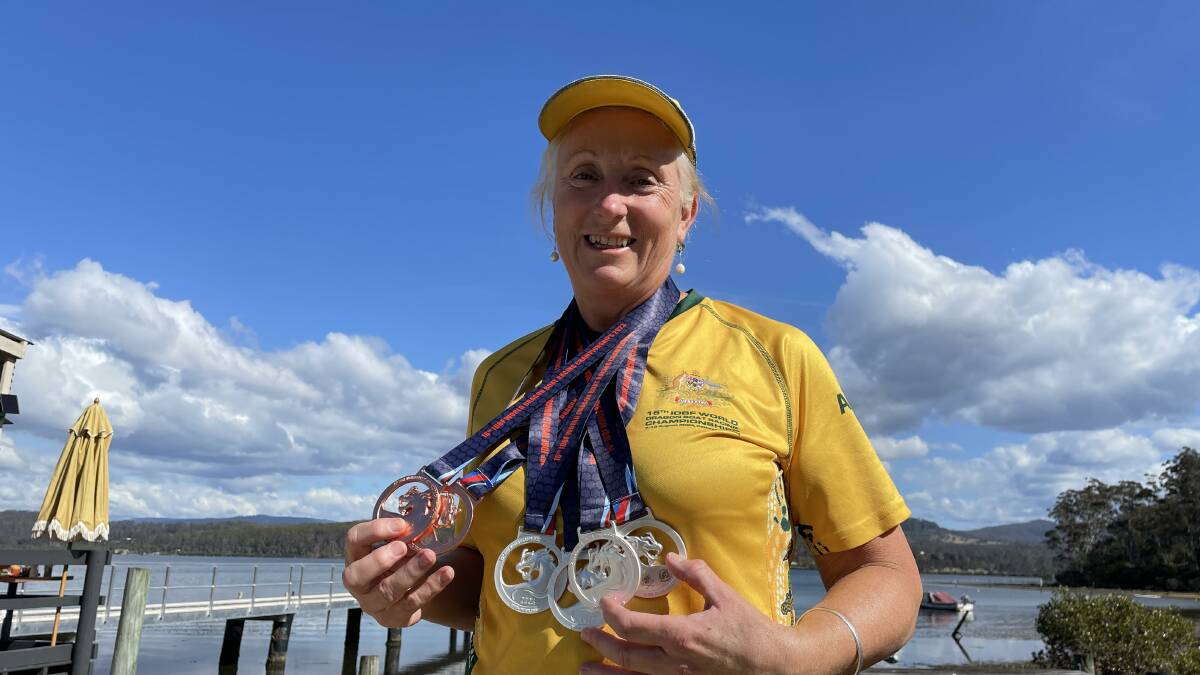 A medal haul; Gill McCallum with the medals won at the World Dragon Boat Championships, Thailand. Picture by Denise Dion