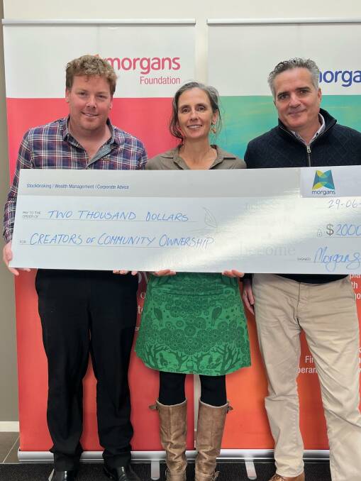 Morgans Merimbula make an initial donation of $2000 to Belinda Morris co-founder of Creators of Community Ownership. Picture supplied