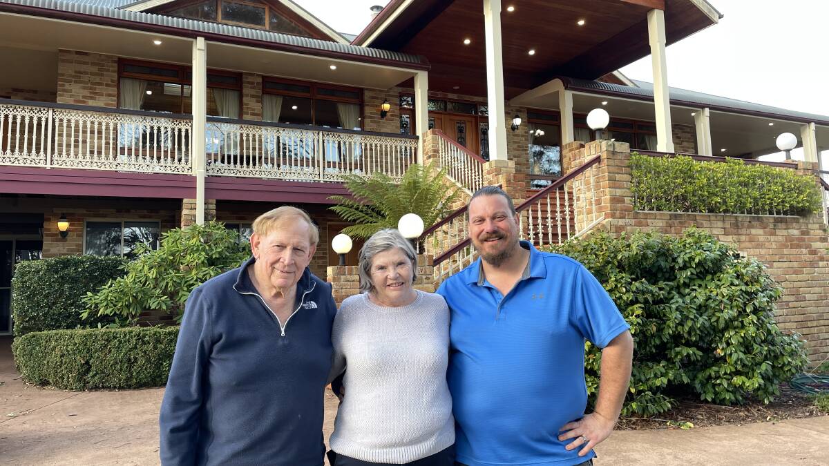 Michael Britten, Robyn Savage and Greg Britten outside their home and business of 23 years. Picture by Denise Dion 